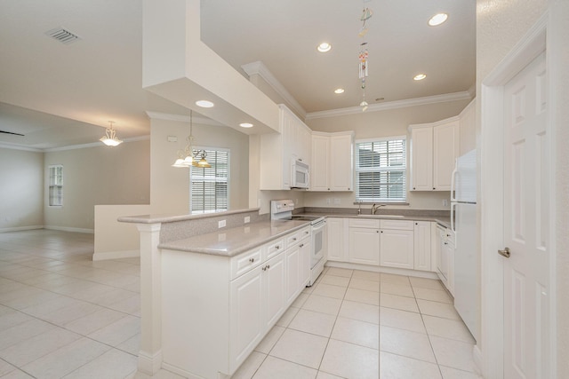 kitchen featuring white cabinetry, kitchen peninsula, pendant lighting, white appliances, and light tile patterned floors