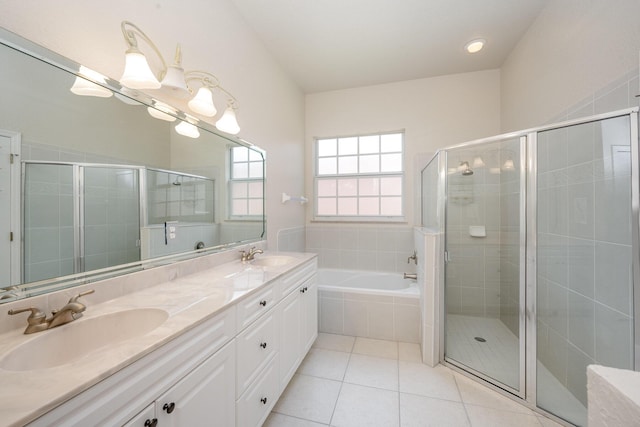 bathroom featuring tile patterned flooring, vanity, and independent shower and bath