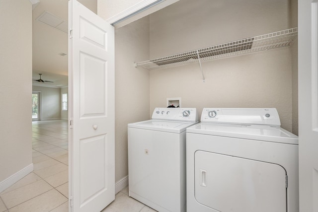 clothes washing area featuring ceiling fan, light tile patterned floors, and independent washer and dryer