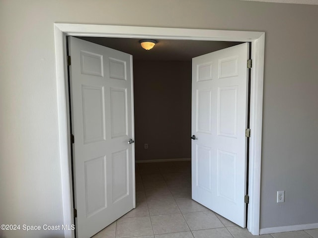 interior space featuring light tile patterned floors