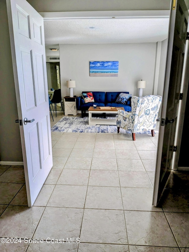 interior space featuring a textured ceiling