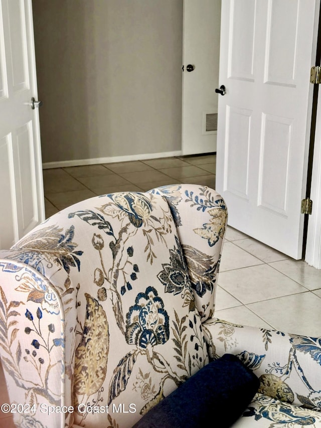 bedroom with tile patterned floors