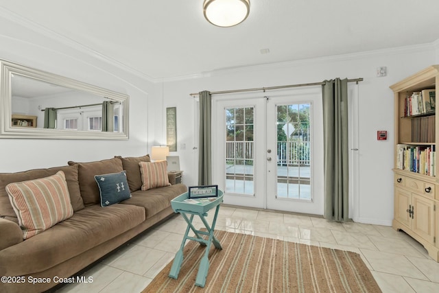 tiled living room with crown molding and french doors