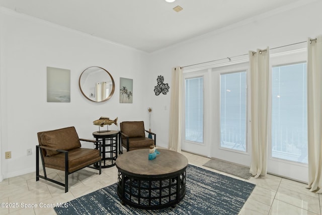 living area with light tile patterned floors and ornamental molding