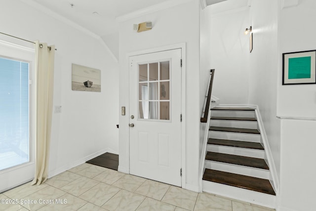 entryway with crown molding