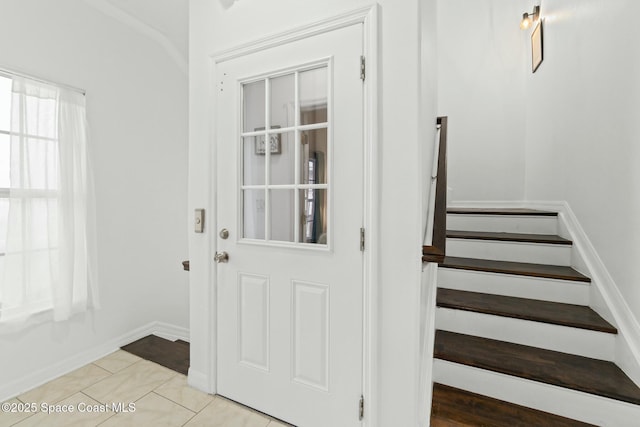 interior space featuring light tile patterned floors