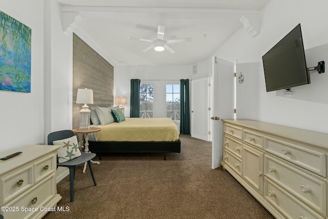 bedroom with dark colored carpet and ceiling fan