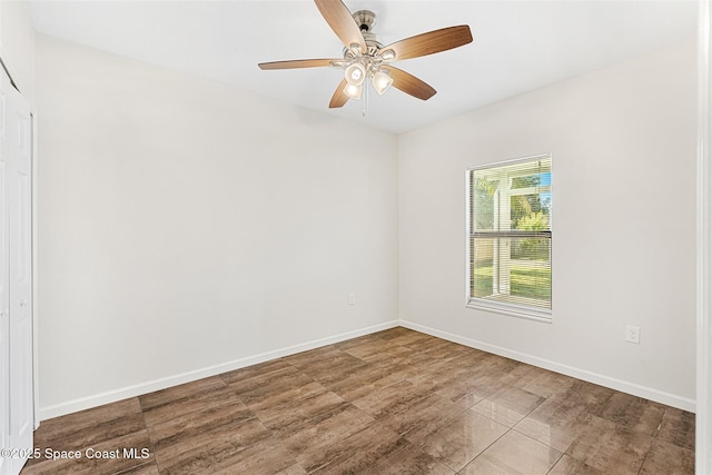 unfurnished room featuring ceiling fan