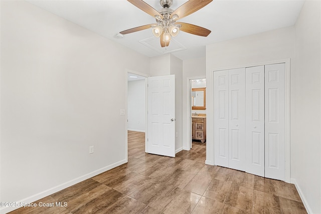 unfurnished bedroom with a closet and ceiling fan