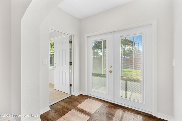 entryway featuring french doors and hardwood / wood-style floors