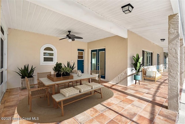 view of patio / terrace with ceiling fan and outdoor lounge area