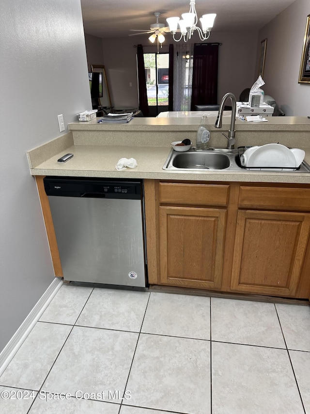 kitchen with dishwasher, ceiling fan with notable chandelier, light tile patterned flooring, and sink