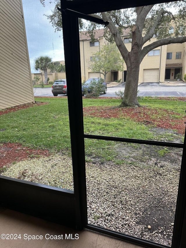 view of yard featuring a garage