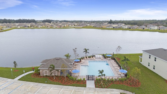 birds eye view of property featuring a water view