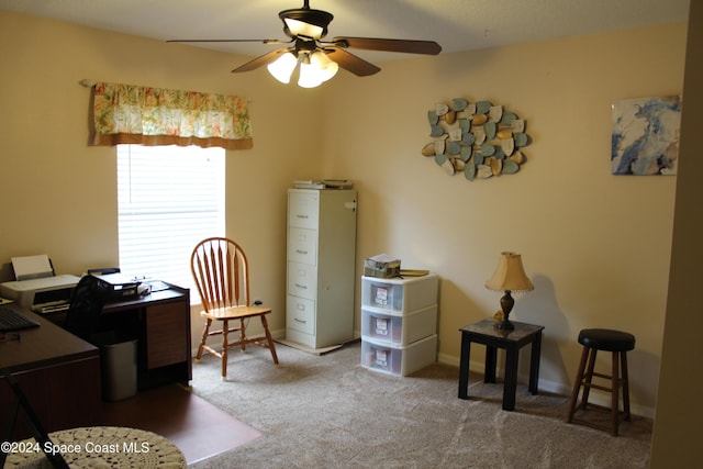 home office featuring carpet floors and ceiling fan