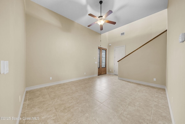 unfurnished room featuring ceiling fan