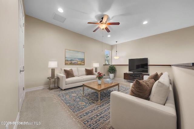 living room featuring ceiling fan and light colored carpet