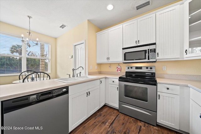 kitchen with sink, white cabinetry, and stainless steel appliances