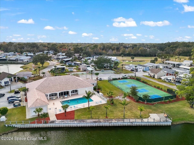 bird's eye view with a water view