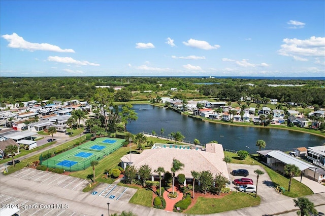 drone / aerial view with a water view