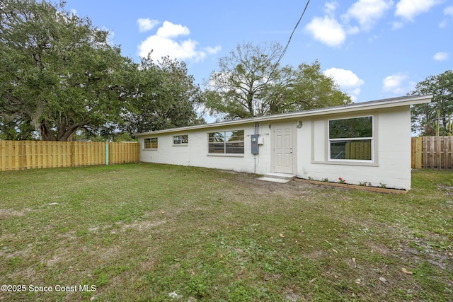 view of front of home with a front lawn