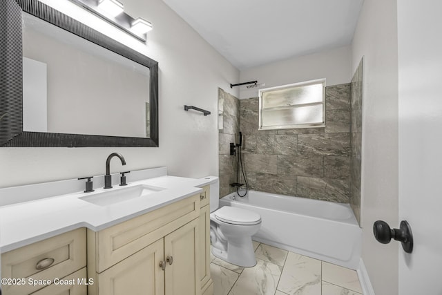 full bathroom with vanity, toilet, and tiled shower / bath