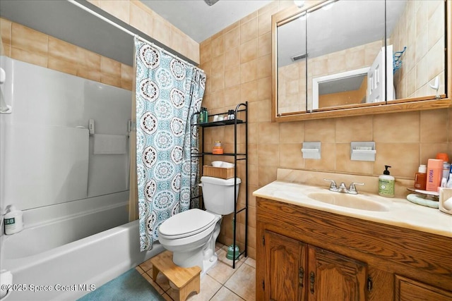 full bathroom with tile patterned floors, tile walls, toilet, vanity, and shower / tub combo