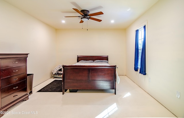 bedroom with a ceiling fan and recessed lighting