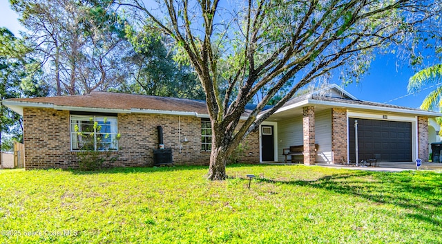 ranch-style house with a garage, a front lawn, and brick siding