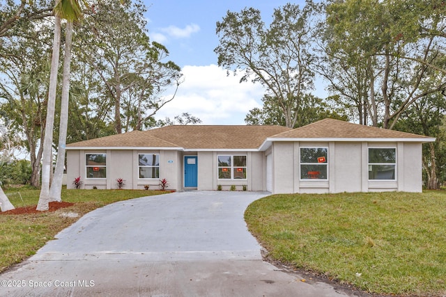 ranch-style house with a front yard