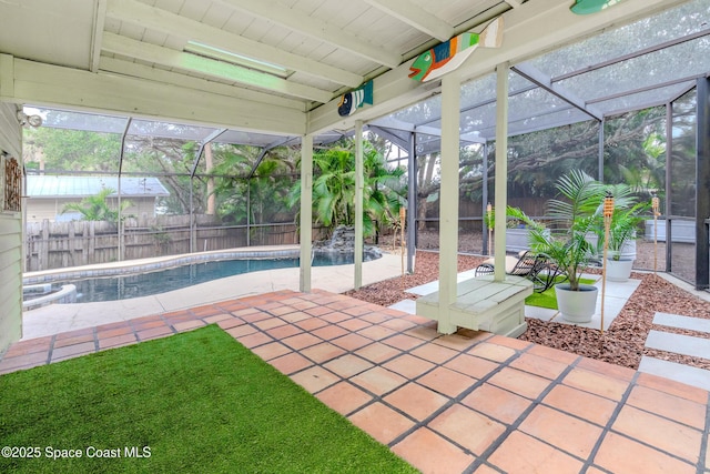 exterior space featuring a fenced in pool, glass enclosure, and pool water feature