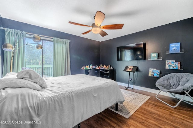 bedroom featuring ceiling fan and hardwood / wood-style floors