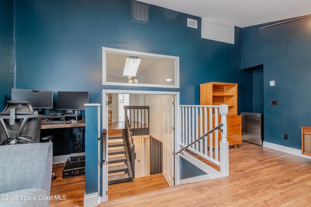 office with hardwood / wood-style flooring