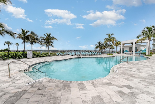 view of pool featuring a patio