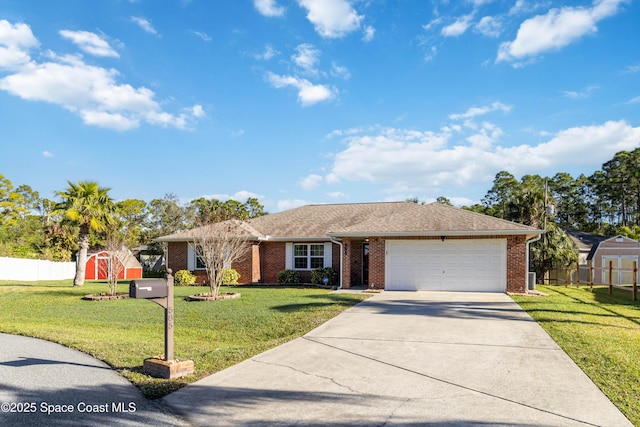 single story home with a front yard, a garage, and a storage shed