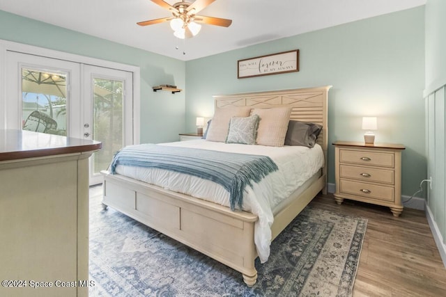 bedroom with access to exterior, ceiling fan, dark hardwood / wood-style flooring, and french doors