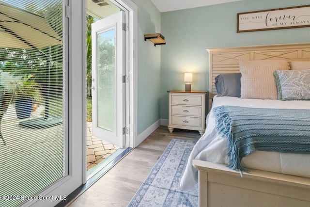 bedroom featuring light wood-type flooring