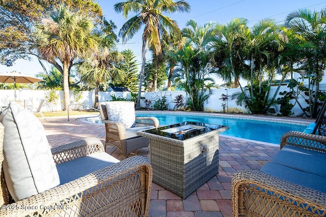 view of pool with a patio area