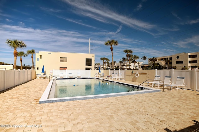 view of pool with a patio area