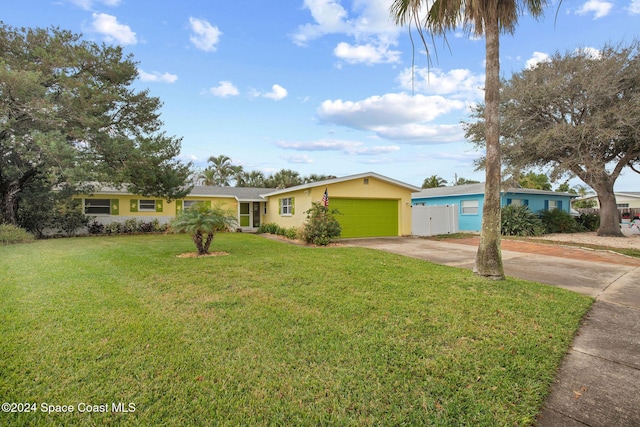 single story home featuring a front yard and a garage