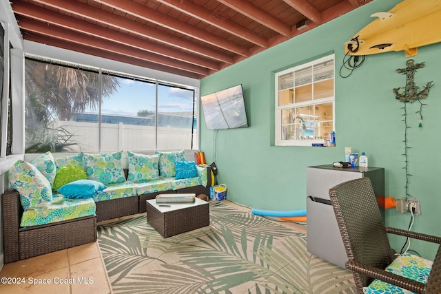 sunroom / solarium with beamed ceiling and wood ceiling