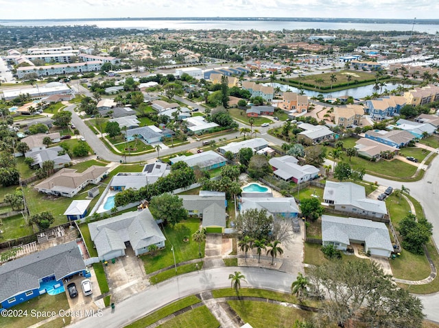 bird's eye view with a water view