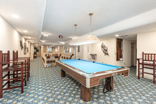 recreation room with carpet floors and pool table