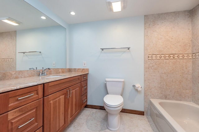 bathroom with tile patterned floors, vanity, and toilet