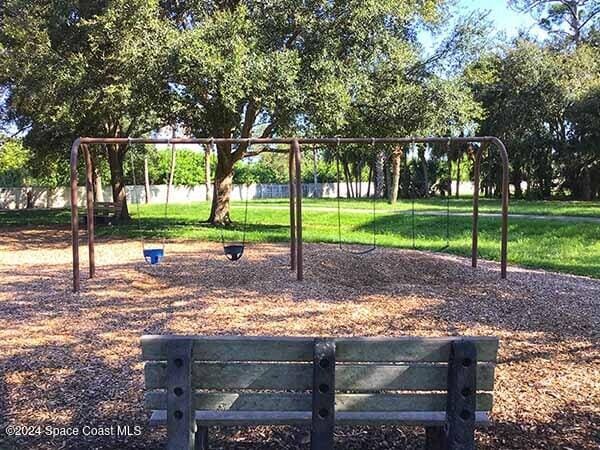 view of play area with a yard