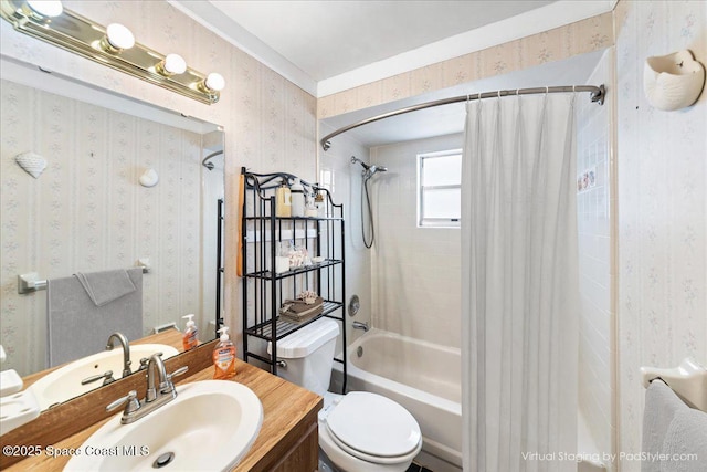 full bathroom featuring vanity, shower / tub combo, and toilet