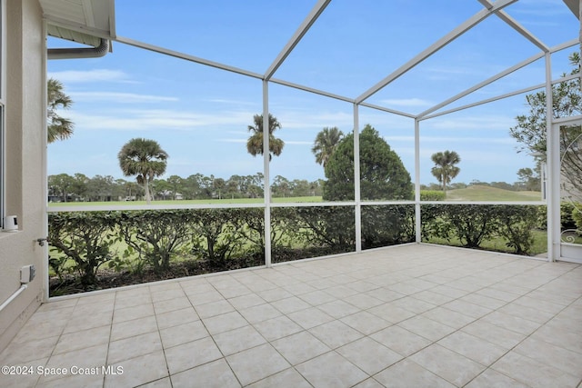 unfurnished sunroom with a wealth of natural light