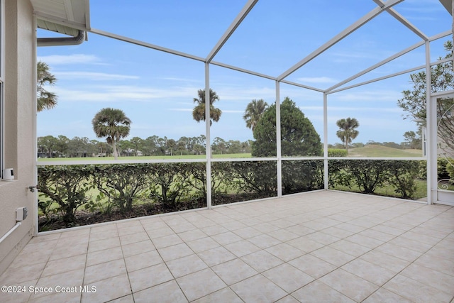 unfurnished sunroom featuring a wealth of natural light