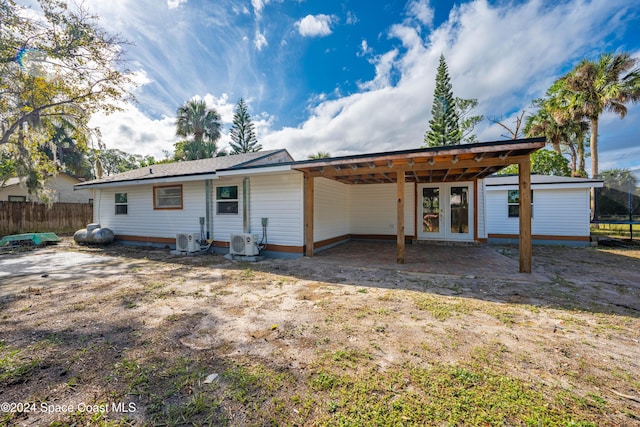 back of property with ac unit