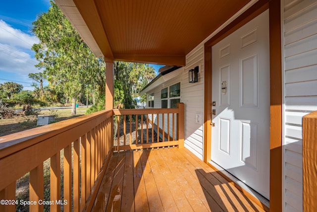 wooden terrace with covered porch